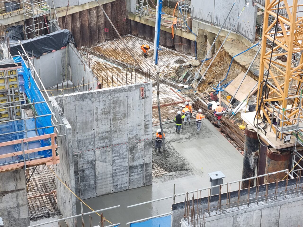 Most of the concrete slab is poured and cured.